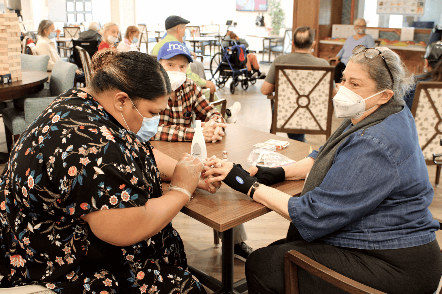 A Senior women enjoying a pedicure at West PACE.