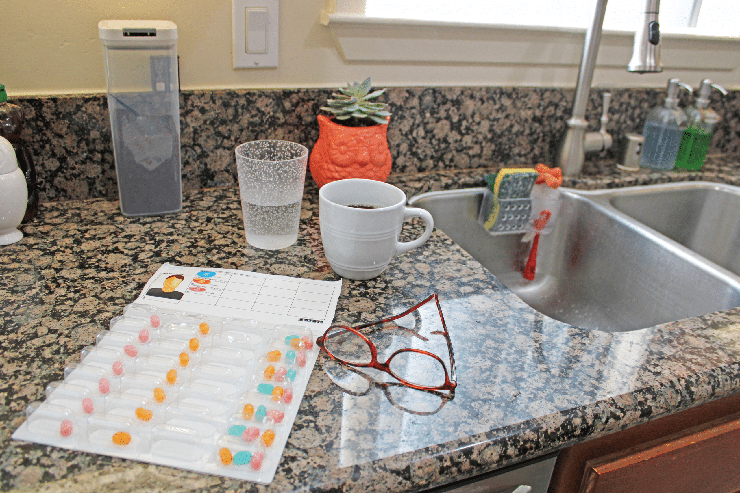 This is an example of a Medication Adhere Card (MAC) in a home setting, using candy to represent the different medications.